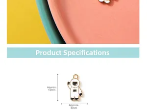 Detail of cartoon astronaut charm with white enamel and golden base, size 16mm by 8mm