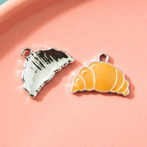 Cute cartoon croissant alloy pendant charm for DIY jewelry making in warm orange enamel