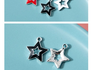 Makro-Detail bunter Sternanhänger mit glatter Emaille-Oberfläche und Metallstruktur