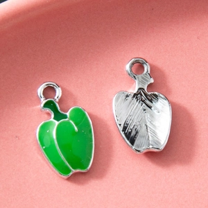 Cartoon green bell pepper alloy pendant with enamel finish shown from front and back views