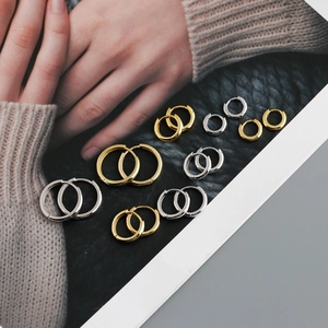 Polished S925 sterling silver hoop earrings in gold and silver finish detail