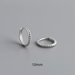 Macro shot of 10mm S925 sterling silver beaded hoop earrings with hallmark and clasp detail