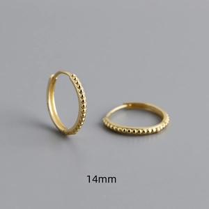 Detail of 14mm gold-plated S925 silver hoop earrings with delicate beaded texture