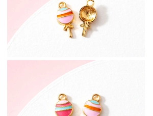 Detailed view of colorful enamel lollipop charms showing front stripes and gold-tone back