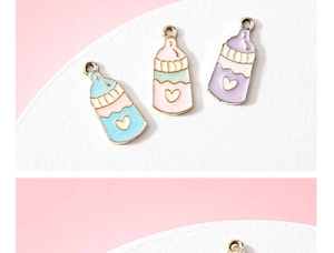Detail of alloy baby bottle charms with colorful enamel hearts for DIY jewelry making