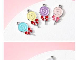 Detail of colorful lollipop charms with bows for DIY jewelry and bracelets