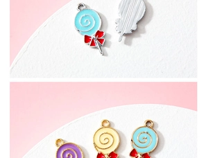 Detailed view of colorful lollipop pendants with alloy enamel finish and red ribbon bow