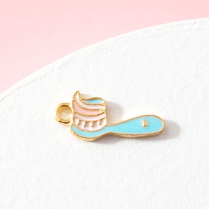 Cute enamel toothbrush and toothpaste pendant with gold trim for DIY jewelry making