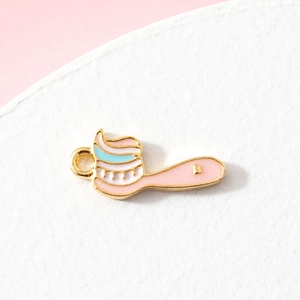 DIY enamel toothbrush charm in pink and blue for bracelets and creative jewelry making