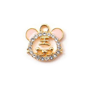 Tiger head pendant with gold plating, pink enamel, and sparkling rhinestones