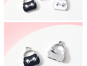 Detail of alloy handbag charms with enamel finish and rhinestone bows for DIY jewelry
