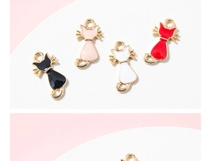 Detailed view of colorful cat-shaped enamel alloy pendants for DIY jewelry making