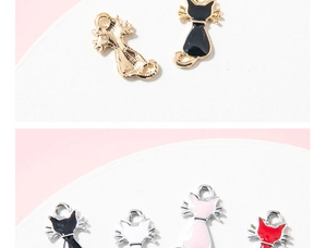 Detail showing colorful cat charms with enamel finish and gold edges for jewelry making