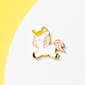Cute unicorn enamel charm with gold plating for DIY jewelry making on white display