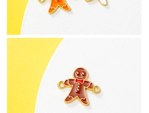 Detail of enameled gingerbread man charms with dual loops for DIY jewelry making