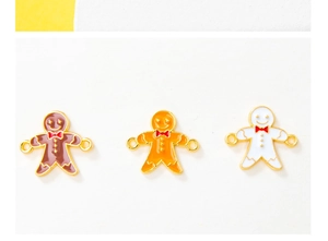 Detail of gingerbread man charms with alloy oil drop finish and dual hanging holes