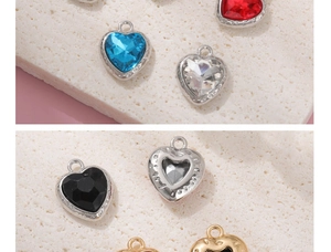 Front and back view of colorful heart-shaped crystal pendants with alloy frames for DIY
