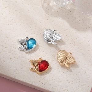 Enamel fox pendants with heart-shaped crystals in gold and silver plating