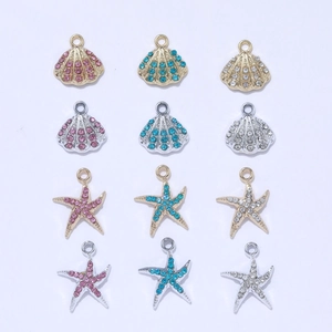 Colgantes de concha y estrella de mar chapados en oro 14K con cristales para joyería