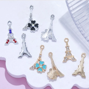 Eiffeltoren hangers in goud en zilver met strassteentjes en emaille bloemen voor sieraden