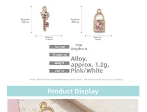 Detailed view of key and star pendants with pink rhinestones for DIY jewelry making