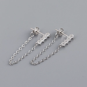 Macro shot of S925 sterling silver stamp on tassel chain earrings with cubic zirconia