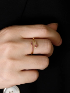 Close-up of S925 silver adjustable ring with pink marquise gemstone and zircon inlay