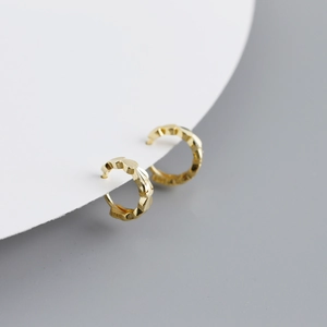 Textured S925 sterling silver heart hoop earrings with elegant gold finish for women