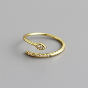 Detailed macro view of S925 silver adjustable ring with gold plating and zircons