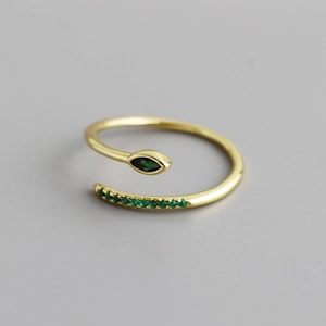 Close-up of golden S925 sterling silver ring featuring a marquise-cut green zircon