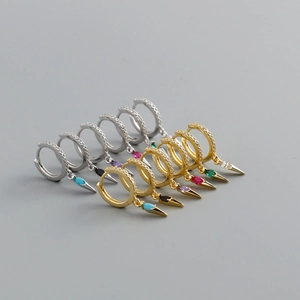 Detailed macro view showing S925 sterling silver earrings set with colorful zircons