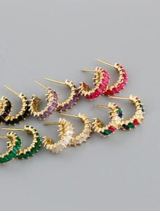 Macro detail of multi-colored square zircon S925 silver earrings in six various colors