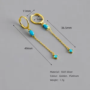 Orecchini a nappa in argento S925 con pietre blu oliva e dettagli placcati oro