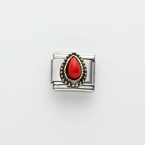 Detail of 9mm Italian charm with teardrop red turquoise set in a gold floral frame