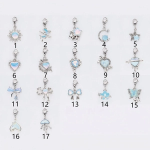 Set of 17 light blue celestial heart and butterfly charms with lobster clasps for DIY jewelry