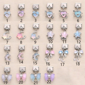 Iridescent star and moon charms on stainless steel modular bracelet links in various designs