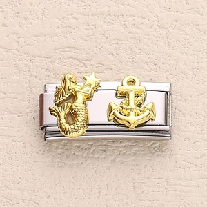 Italian modular charm link in stainless steel with golden mermaid and anchor motifs