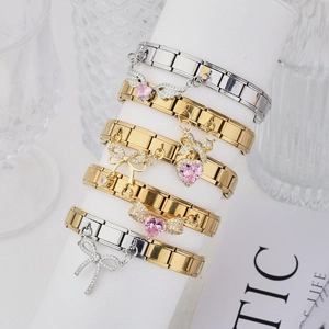 Bracelet italien plaqué or 18 carats avec cœur en zircon rose et breloques de nœud