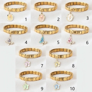 Italian modular charm bracelet in gold stainless steel with colorful enamel butterfly tulip charms