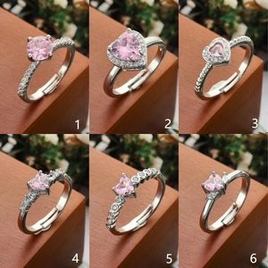 Adjustable silver rings set with pink zircon heart and round stones in various designs