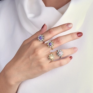 Bagues tournesol rotatives en zircon micropavé finitions or et argent pour femme