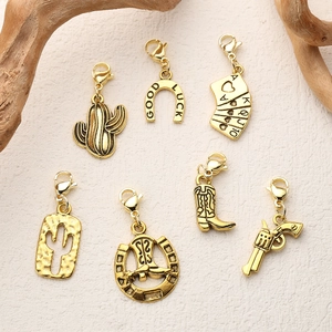 7pcs gold western cowboy charms set including horseshoe cactus and pistol with lobster clasps