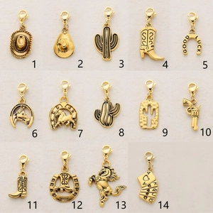 Set of 14 gold Western cowboy charms including hat and cactus with lobster clasps