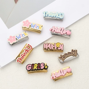 Italian charm bracelet links in stainless steel with colorful enamel words and patterns