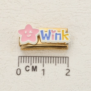 Italian charm link featuring a pink wink star and gold stainless steel base with ruler