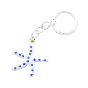 Minimalist beach style starfish keychain with blue polka dots and white chain accessory