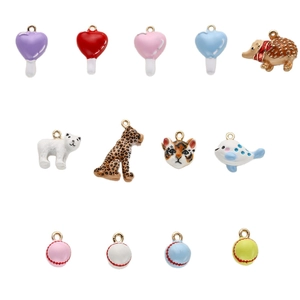 Enamel animal and balloon pendants in assorted styles with gold jump rings