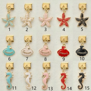 Italian modular charm collection with starfish and shell pendants in five enamel colors