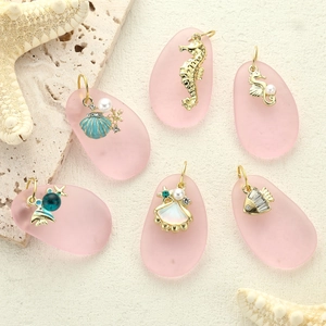 Marine life alloy pendants with pink frosted stones, pearls and enamel details
