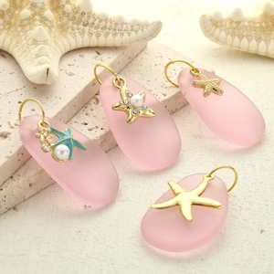 Frosted pink starfish pendants with gold alloy accents and pearls for jewelry making